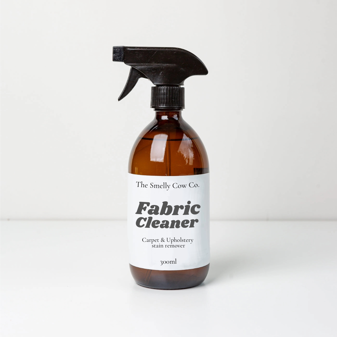 An amber 300ml refillable spray bottle for fabric cleaning or refreshing.