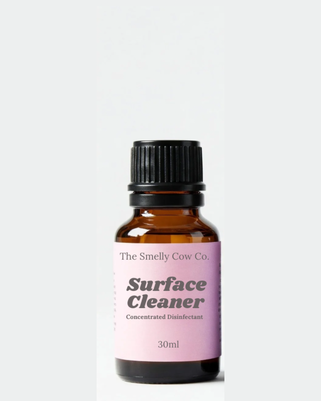 A 30ml amber glass bottle with surface cleaner inside.
