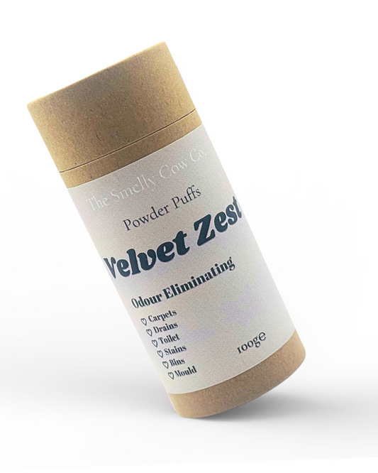 a brown craft cardboard tube with sifter top and lid. An off white label promoting  6in1 multi-purpose powder cleaner, scented in velvet zest.